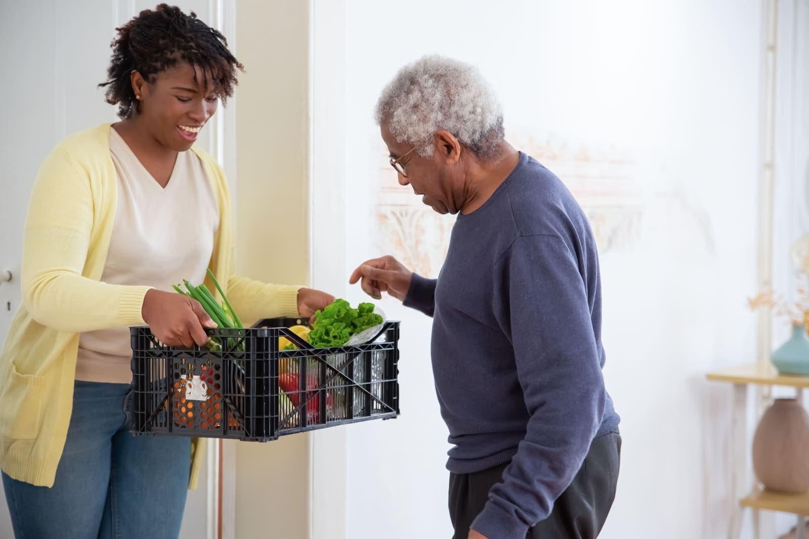 Support worker helping with grocery assistance